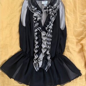 You know what they say, “the bigger the ruffle, the closer to gawd!”